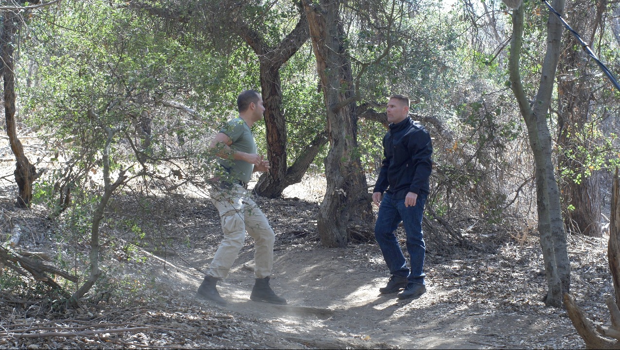 Screen Shot: Agent Rimes (Mahrt), and Sgt. Lanson (Von Halle), on the set of 