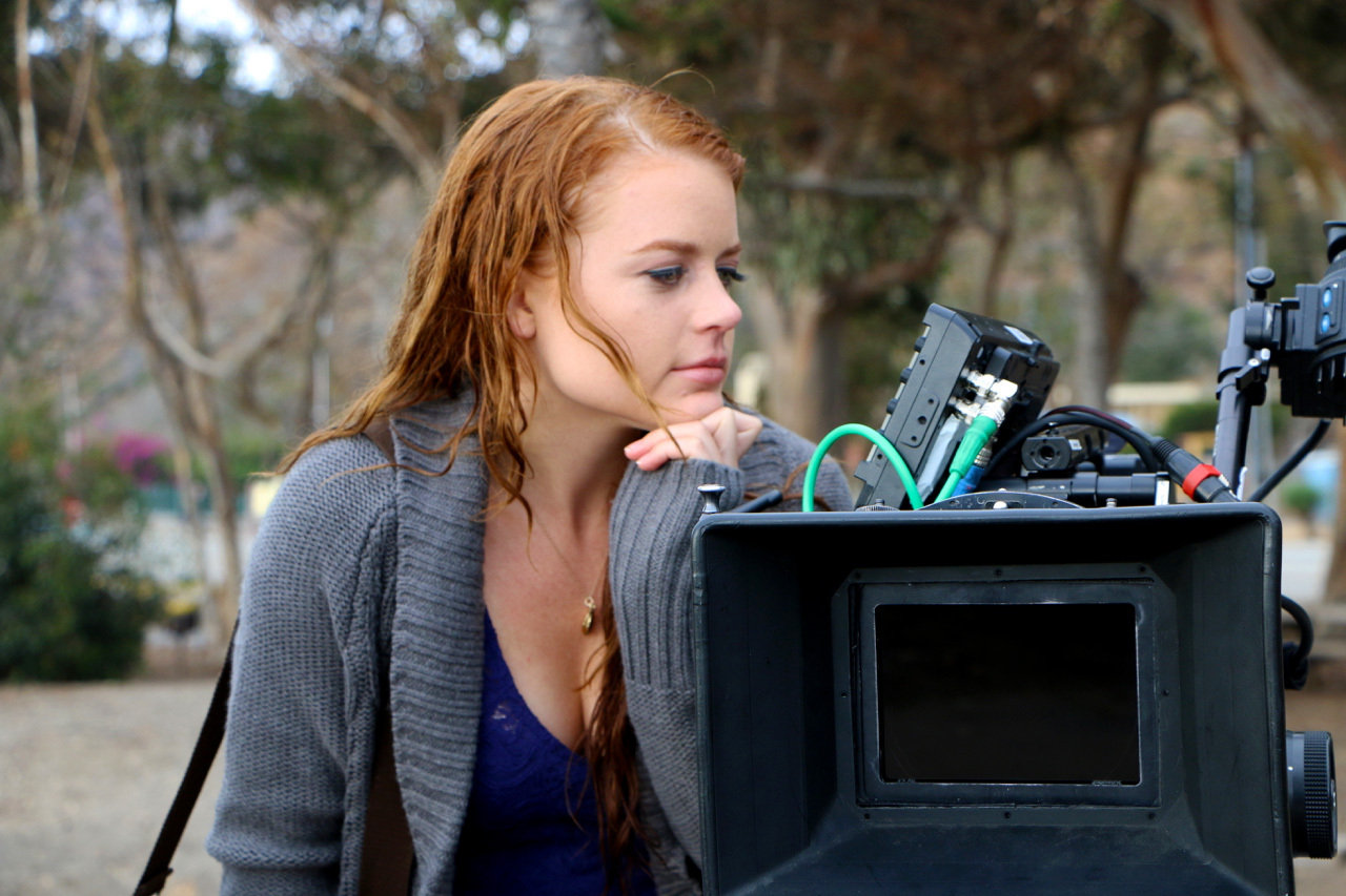 Director Sarah Phillips watches the monitor for playback.