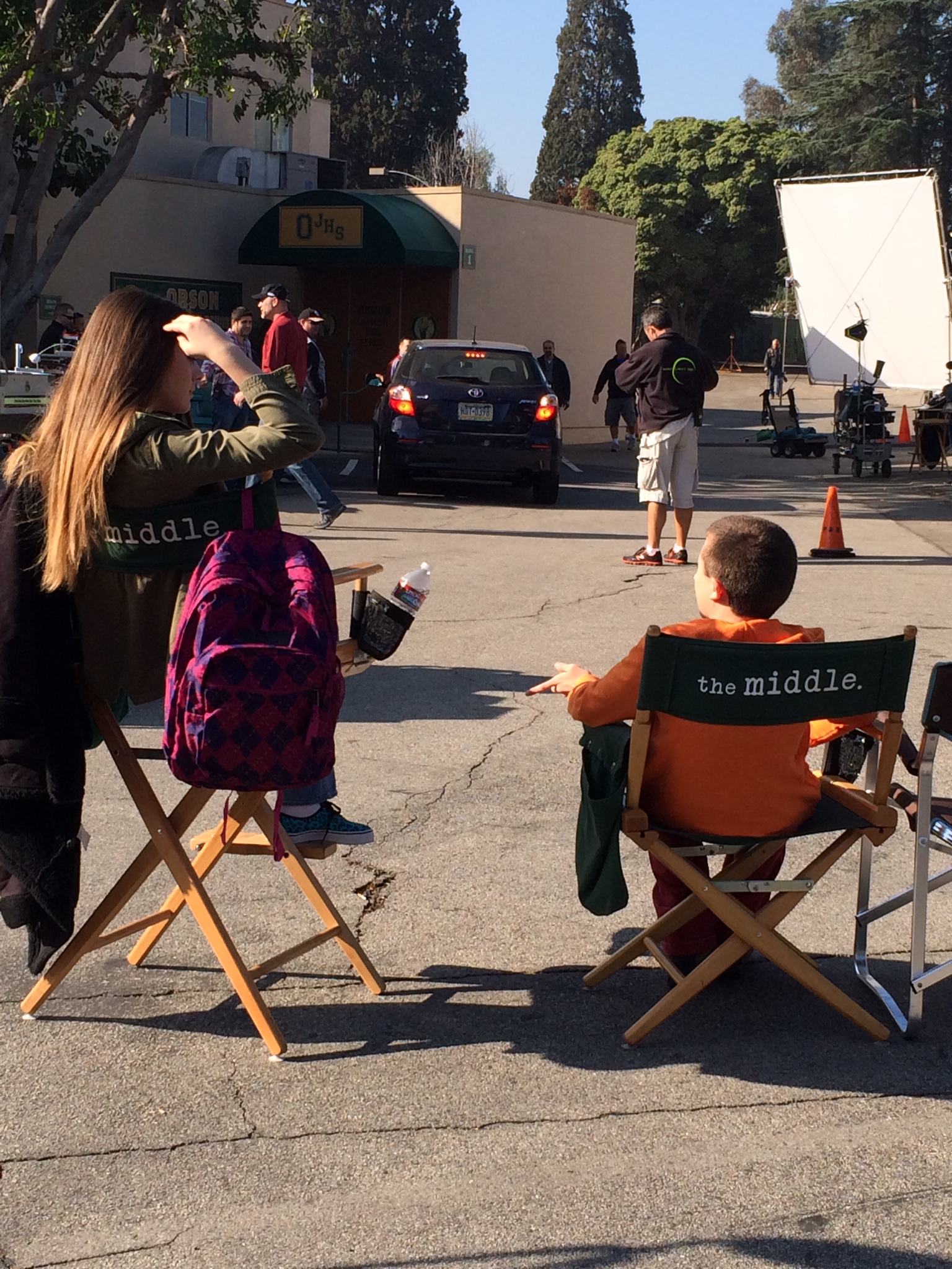 Ava Allan & Atticus Shaffer in between takes on the set of 