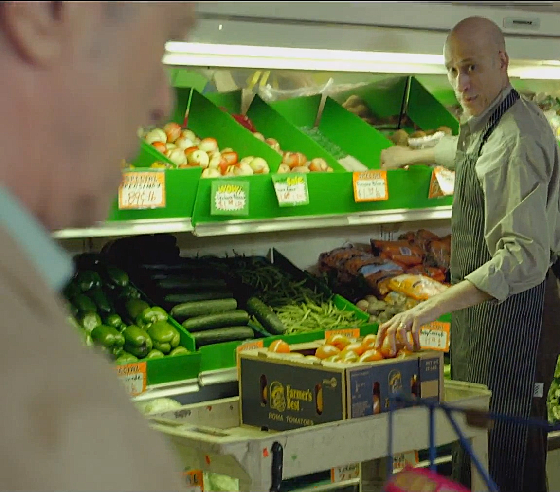 Max Bogner as Phil, The Green Grocer, with David Bowie (in foreground) in his recent music video: 