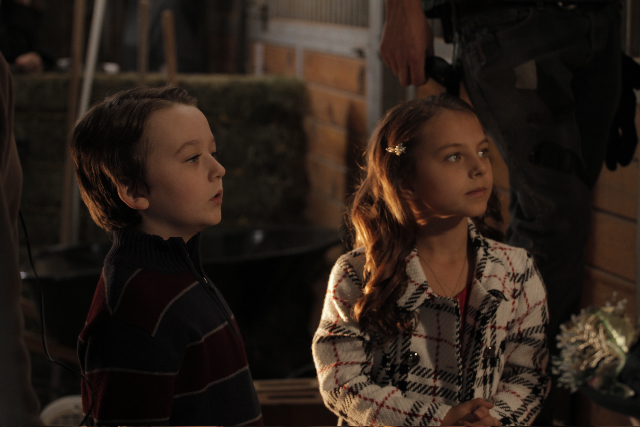 BENJAMIN STOCKHAM and CAITLIN CARMICHAEL on the set of A COUNTRY CHRISMTAS