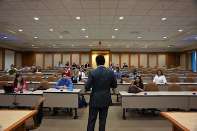 Aronfeld lecturing at law school.