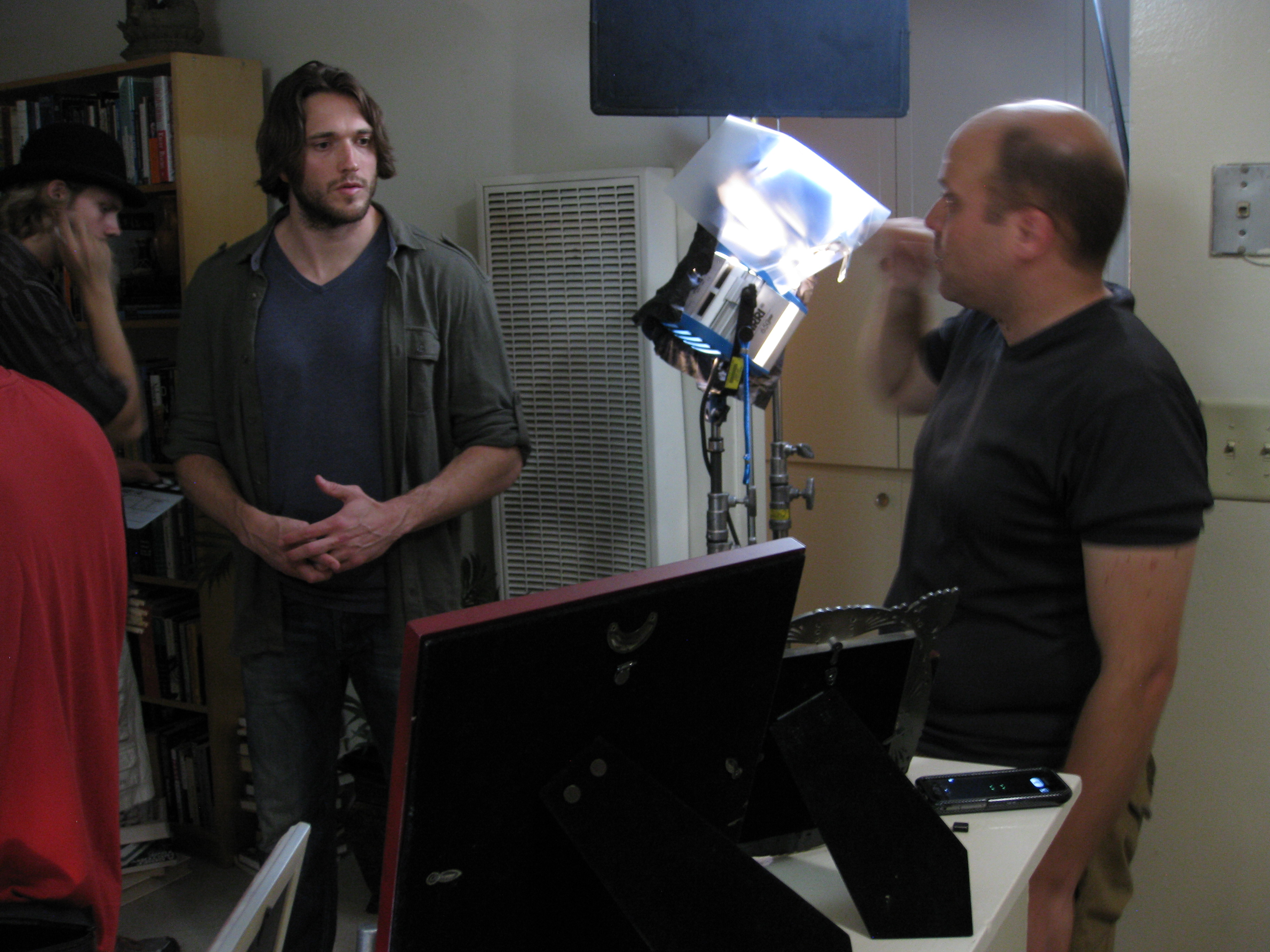 Anouar H. Smaine blocking a scene with actor Eric Avery on the set of Award winning 