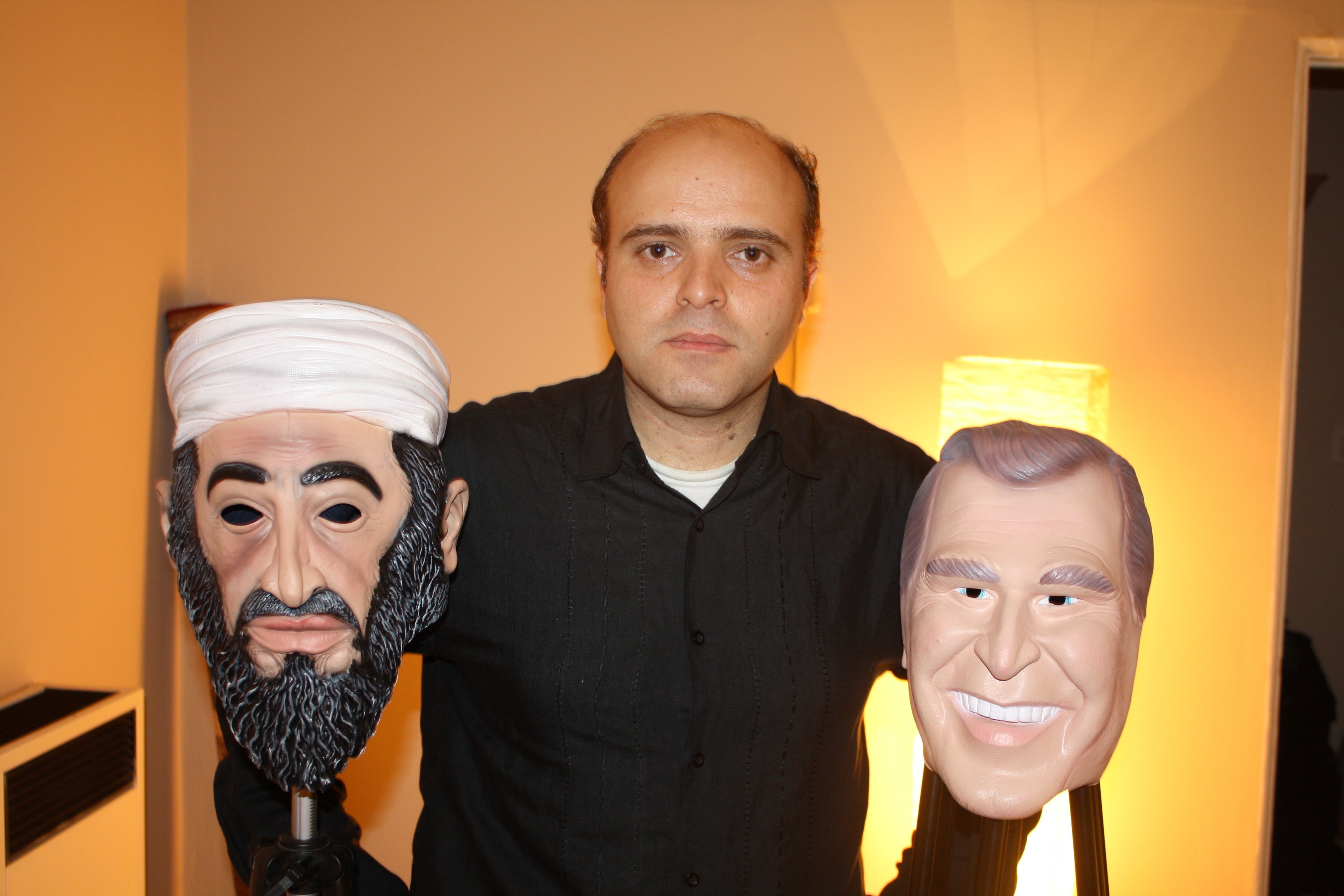 Anouar H. Smaine posing with the two main characters of his film, on the set of 