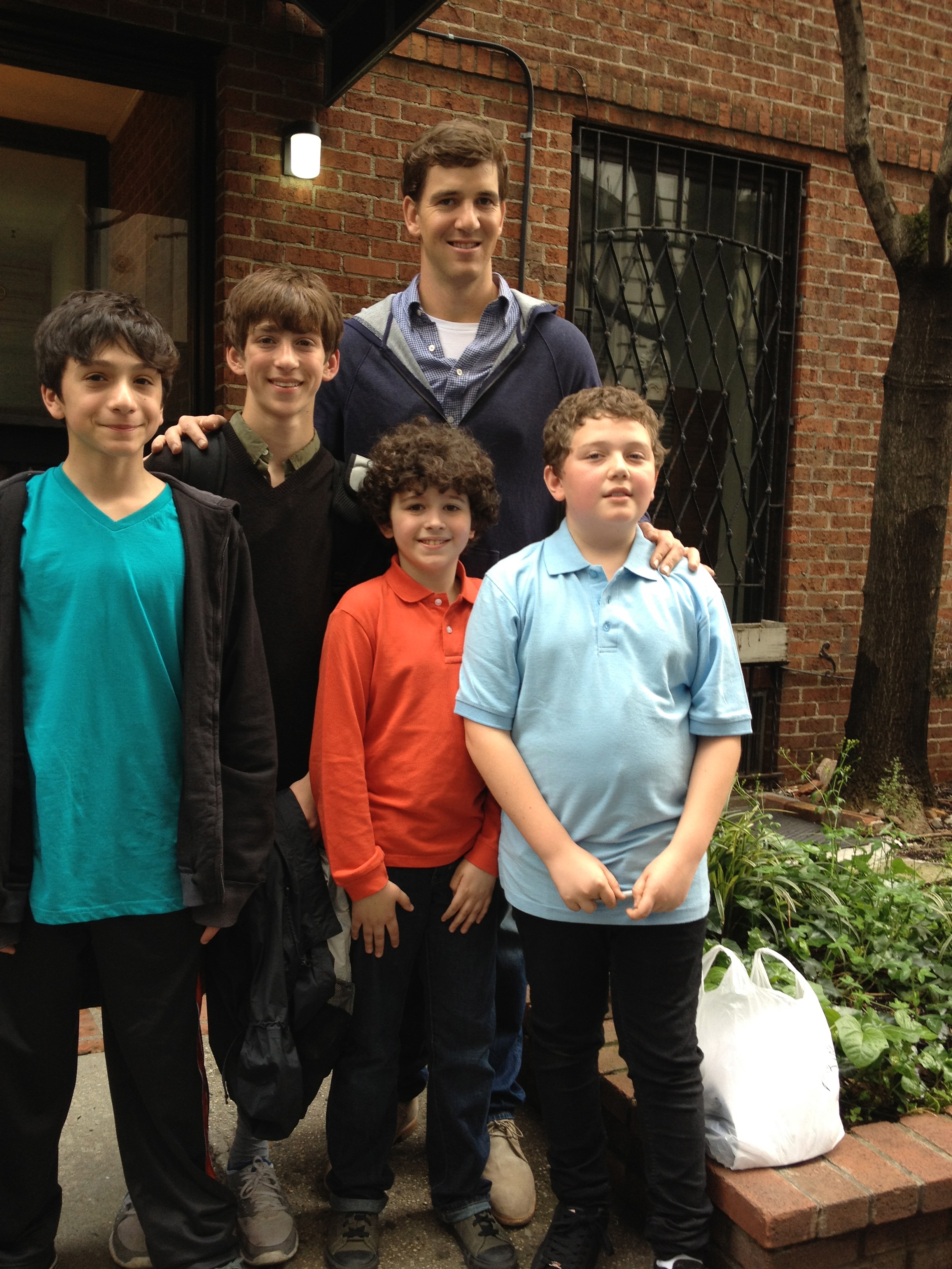 Joseph with Eli Manning and friends from 05/05/2012 Saturday Night Live