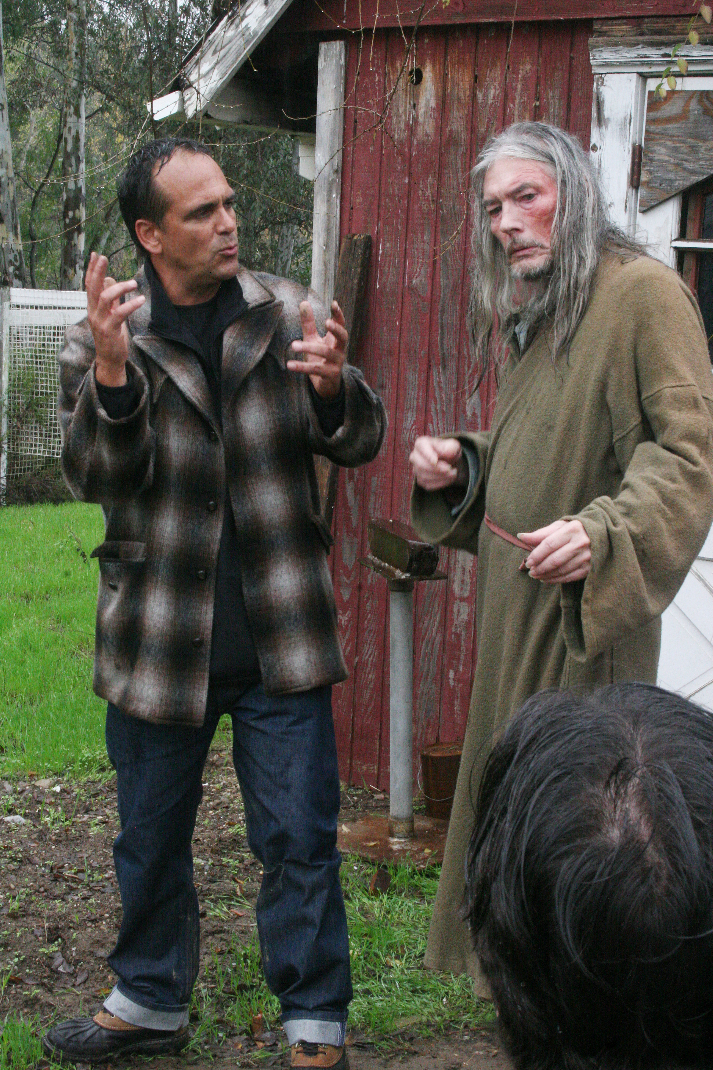 Behind the scenes from the movie Black Asylum,directed by Robert Rusler. Robert Rusler goes over a scene with Billy Drago.