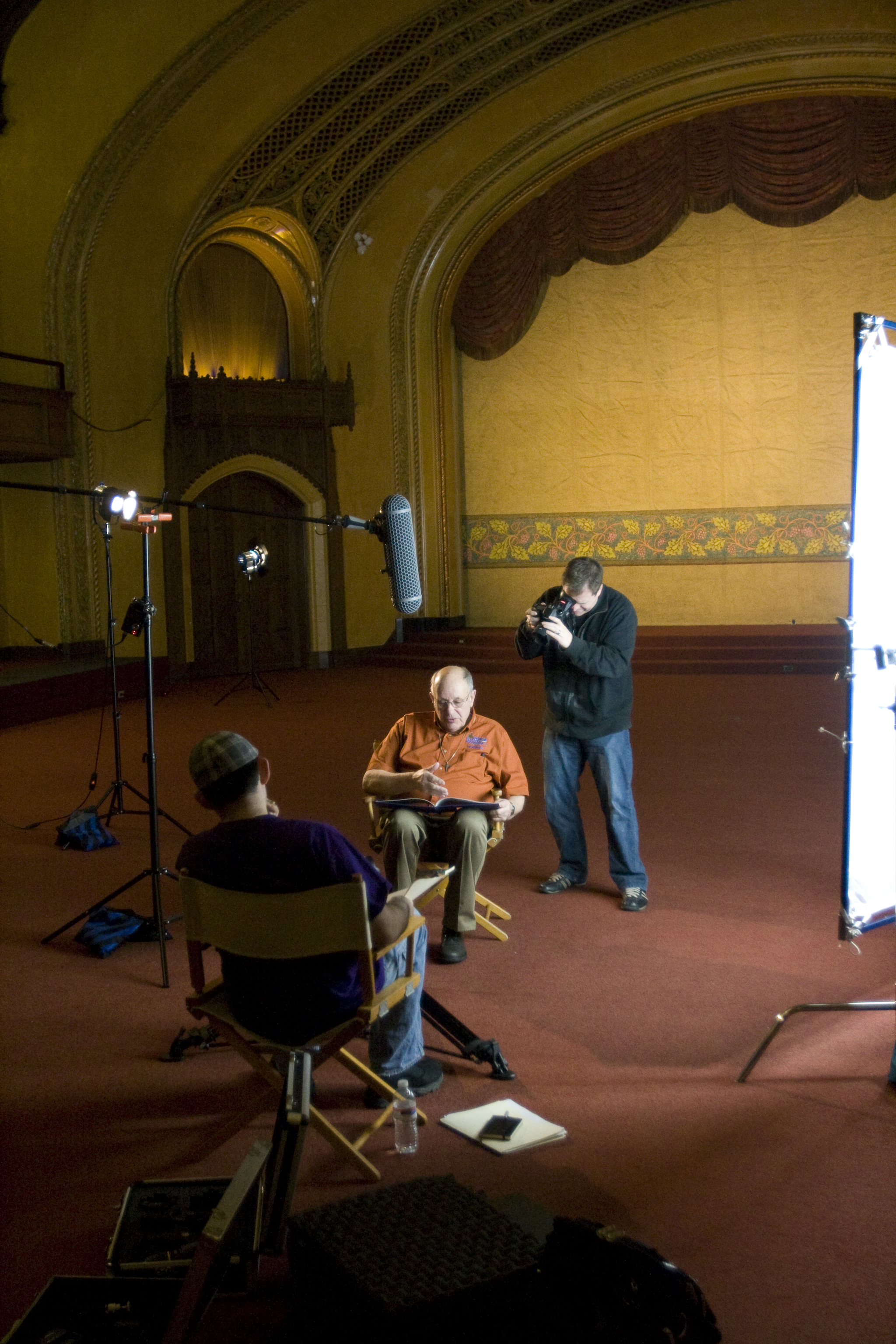 BTS Photo of Josh interviewing Marcel Blaakman, WWII Survivor & Veteran. Andrew Manzano, DP, gathering B-roll.