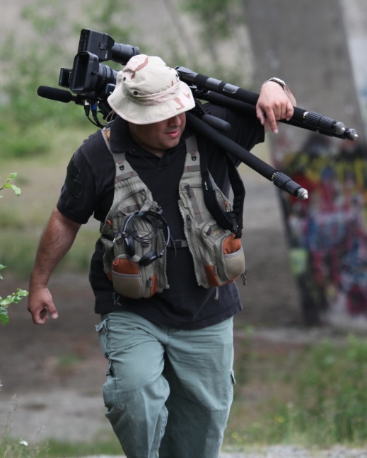 Dan Barrios on location in Alaska covering Border Patrol Search and Rescue (BORSTAR) Swift Water Rescue operations