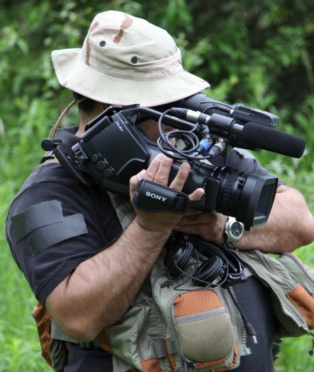 Dan shooting Border Patrol Rescue (BORSTAR) swift water rescue training in Eagle River Alaska.