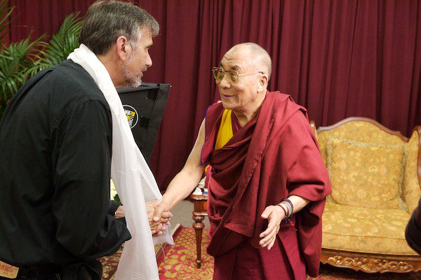 Richard P. Alvarez meeting His Holiness the Dalai Lama in preparation of shooting an interview.