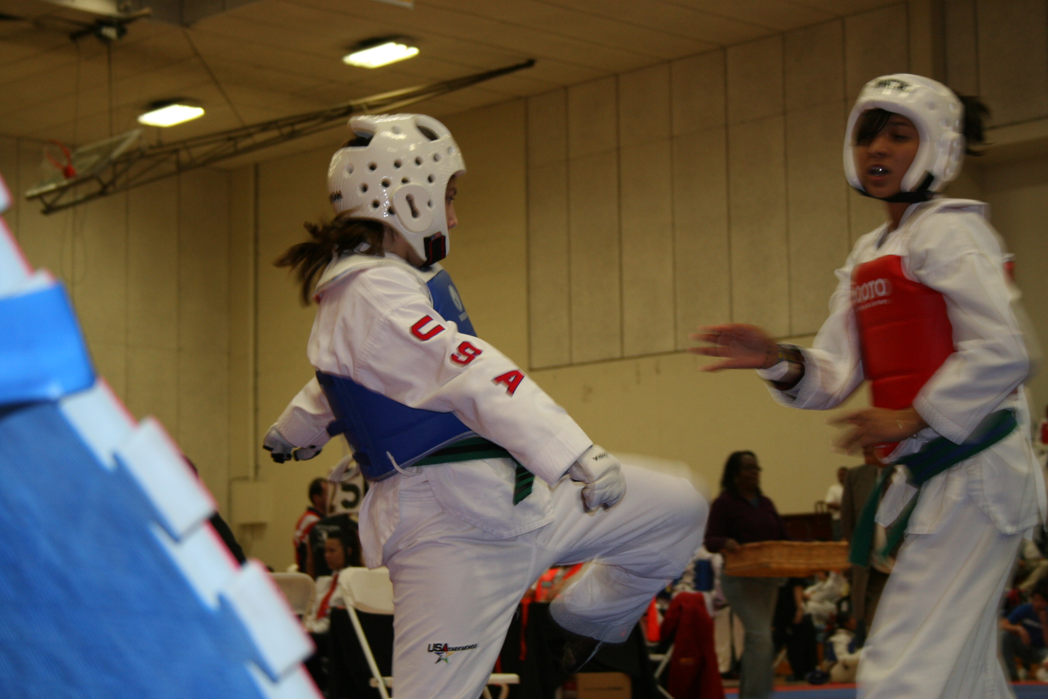 Tae Kwon Do tourney first place Kaleigh in blue