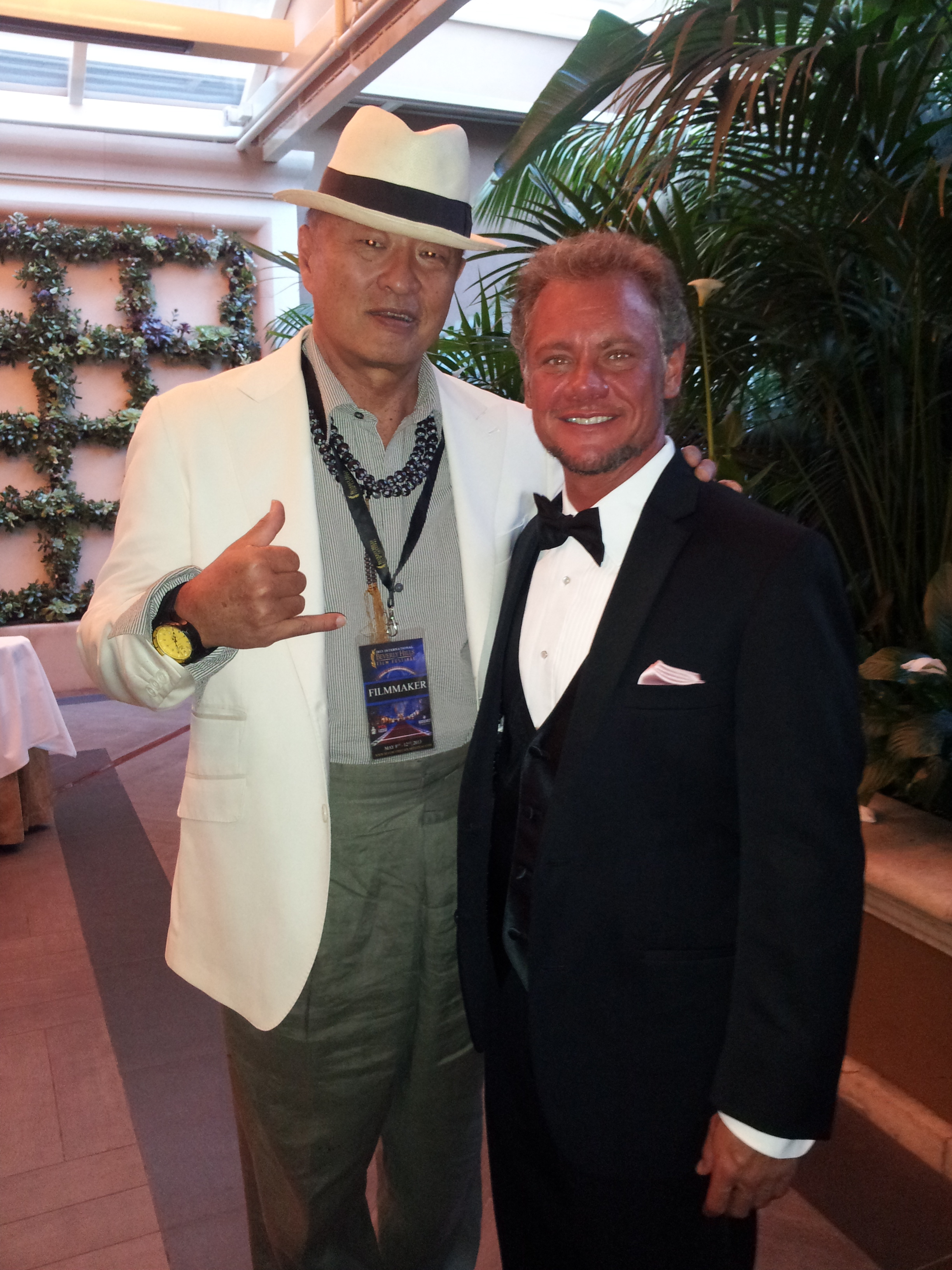 Cary Hiroyuki Tagawa and Tracy Kowalski at the Four Seasons Beverly Hills, awards night for the Beverly Hills Film Festival 2013.