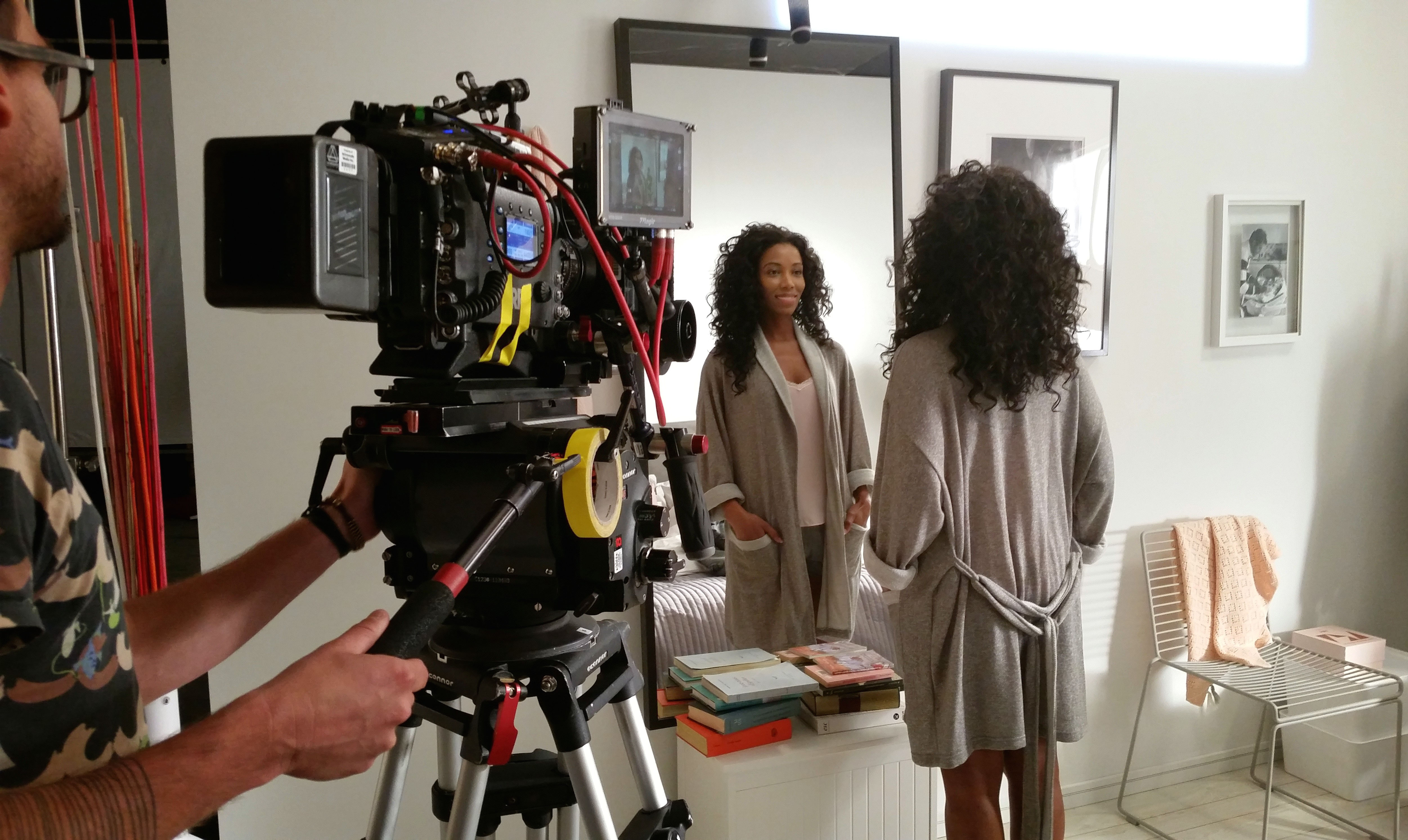 Dory Jean-Louis on set shooting a television commercial for a skincare beauty product (2015)