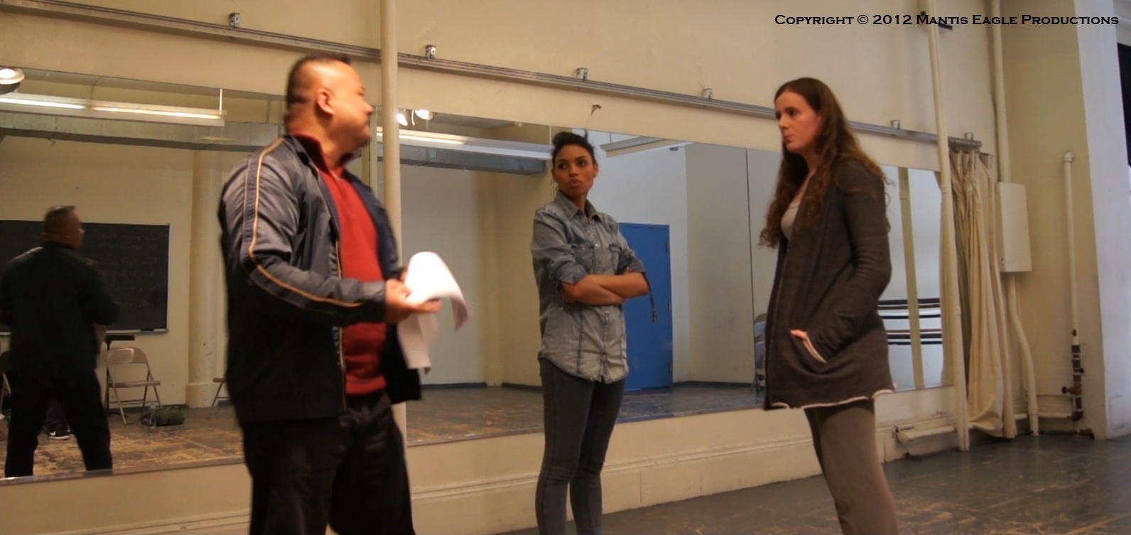 Director Joseph Villapaz with Gabrielle Ryan and Jenna Conroy during rehearsals.