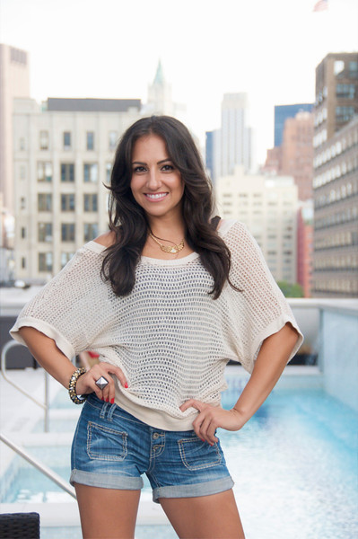 Amber Valdez, Host atop the Trump Soho while covering the 
