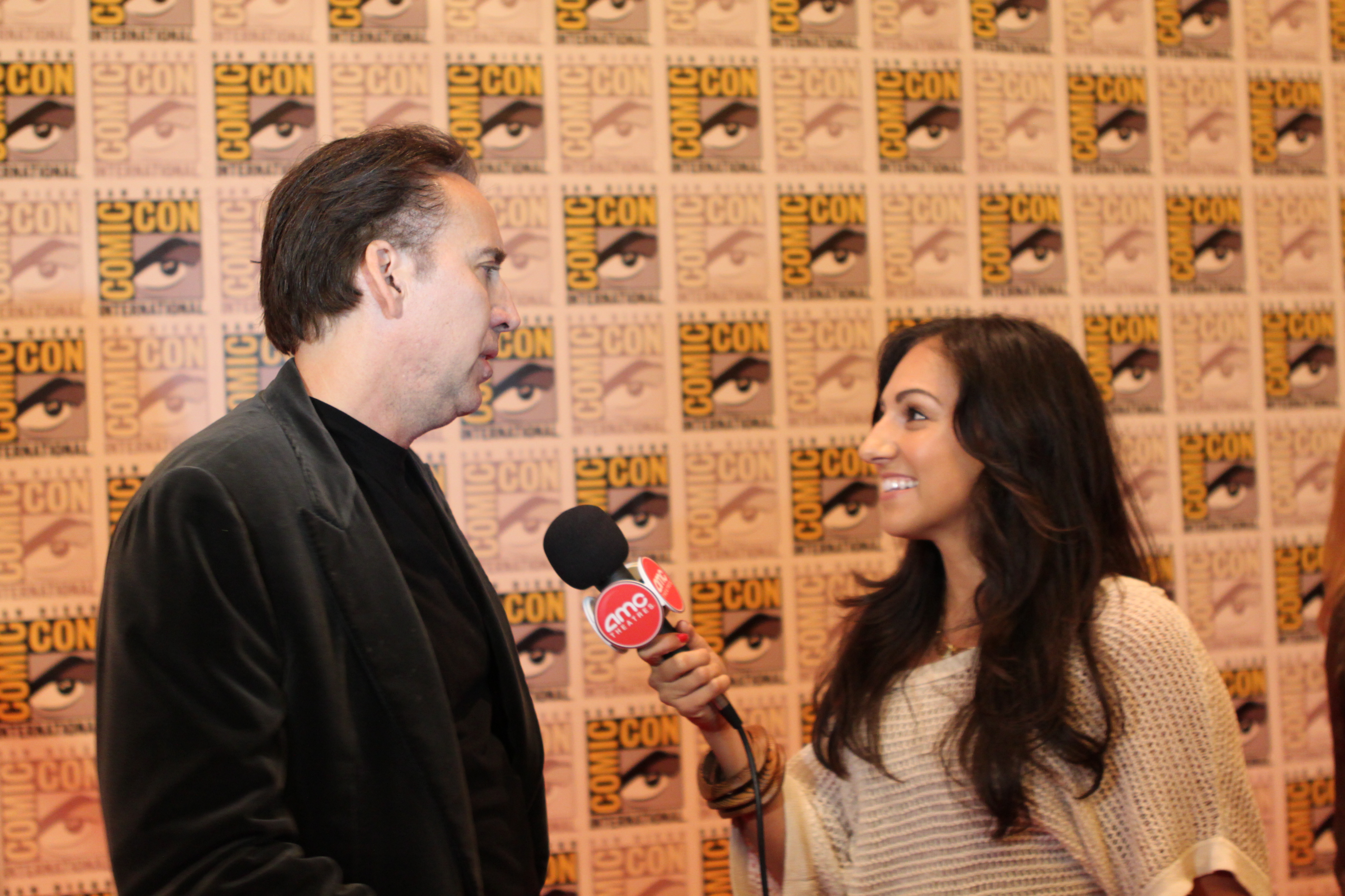 Amber Valdez covers 2011 Comic Convention, San Diego CA pictured here with Nicholas Cage for AMC Theatres