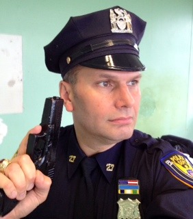 In action scene in upcoming film as NYPD Officer, - off set pic.