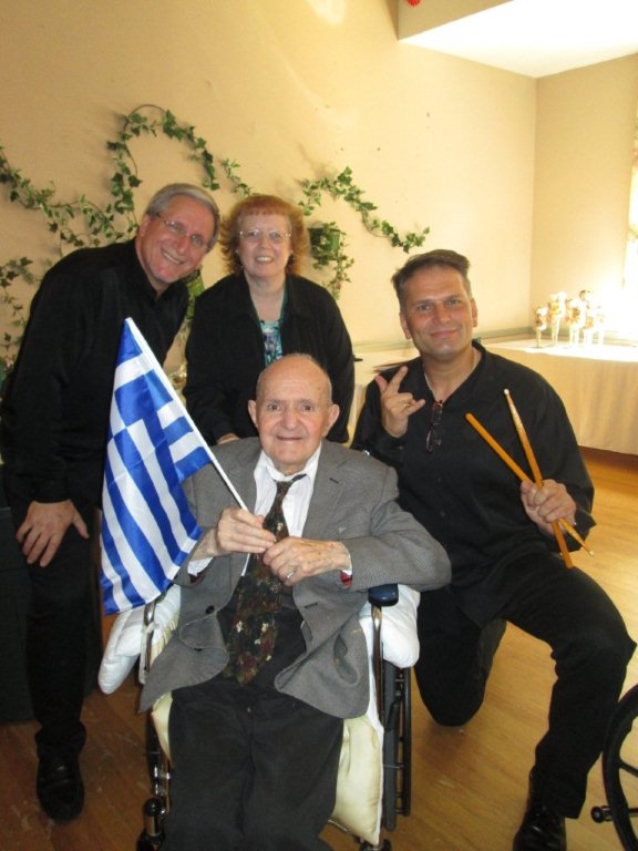 Performing with my Greek Band Athena with bouzouki ace Gabe Condos and greeting some of the guests after....Opa!