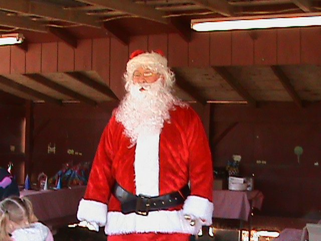 Mike Hudspeth-Playing Santa.