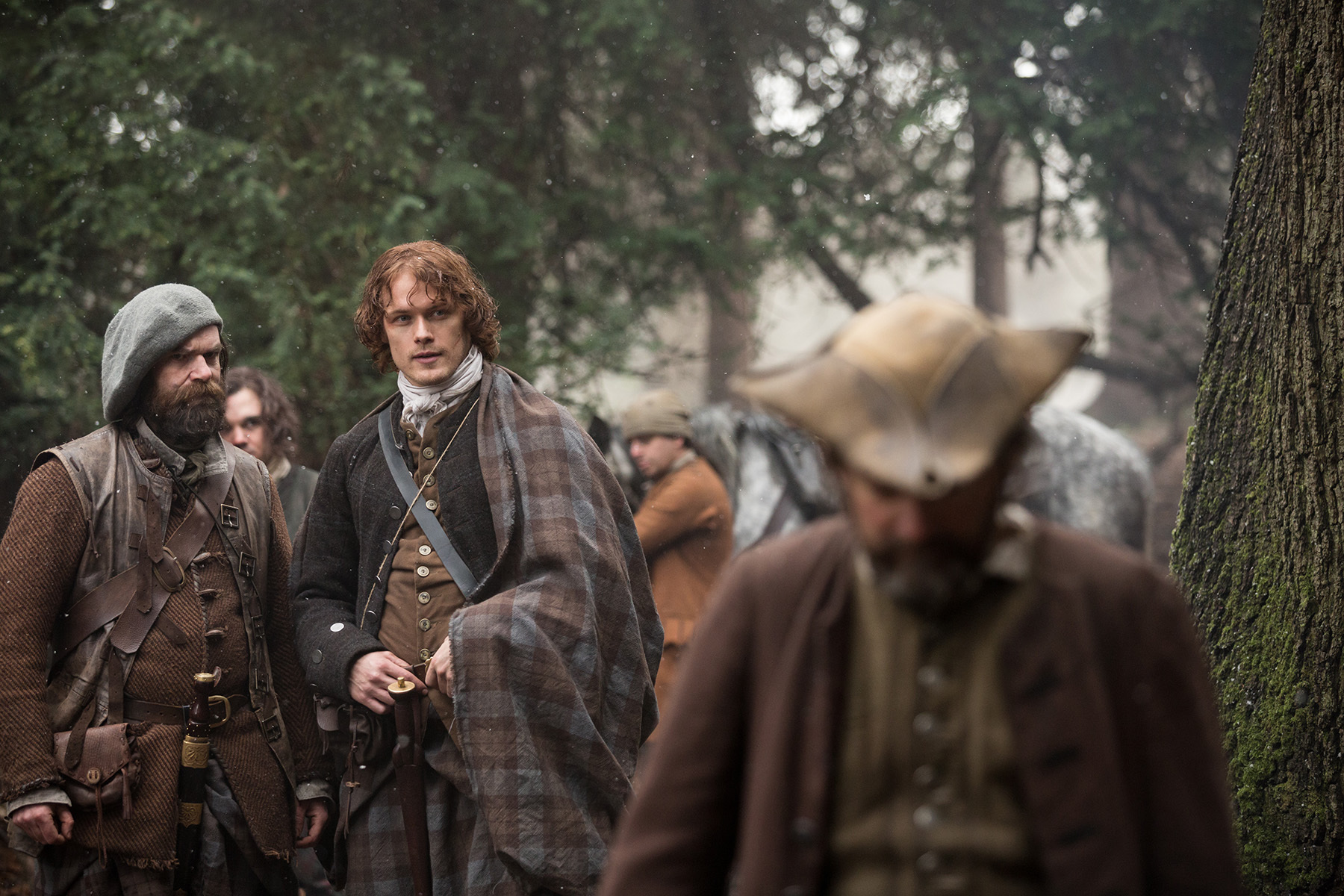 Still of Sam Heughan, Finn Den Hertog and Duncan Lacroix in Outlander (2014)