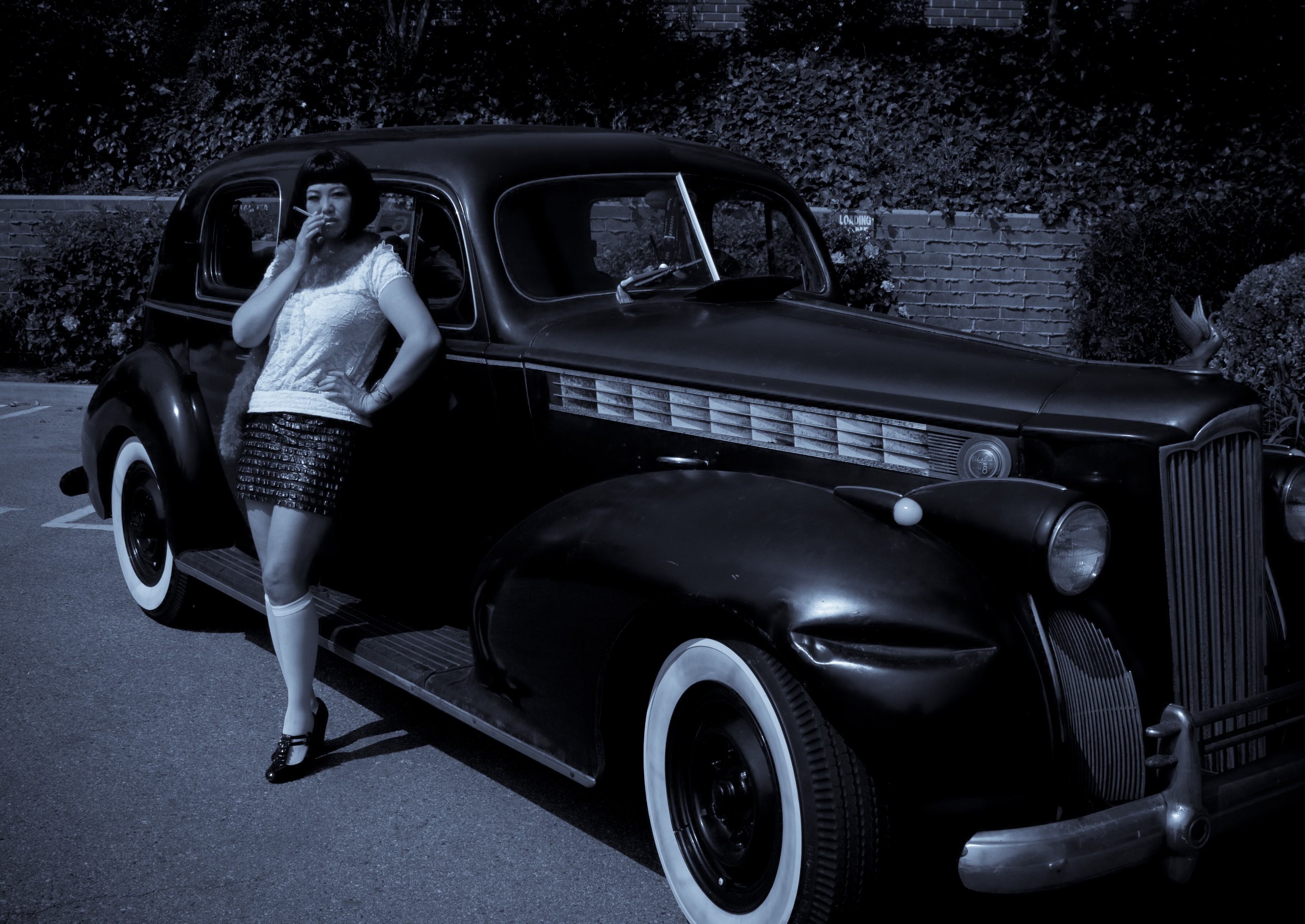 Grace Yang with her collectible car 1940 Super 8 Packard