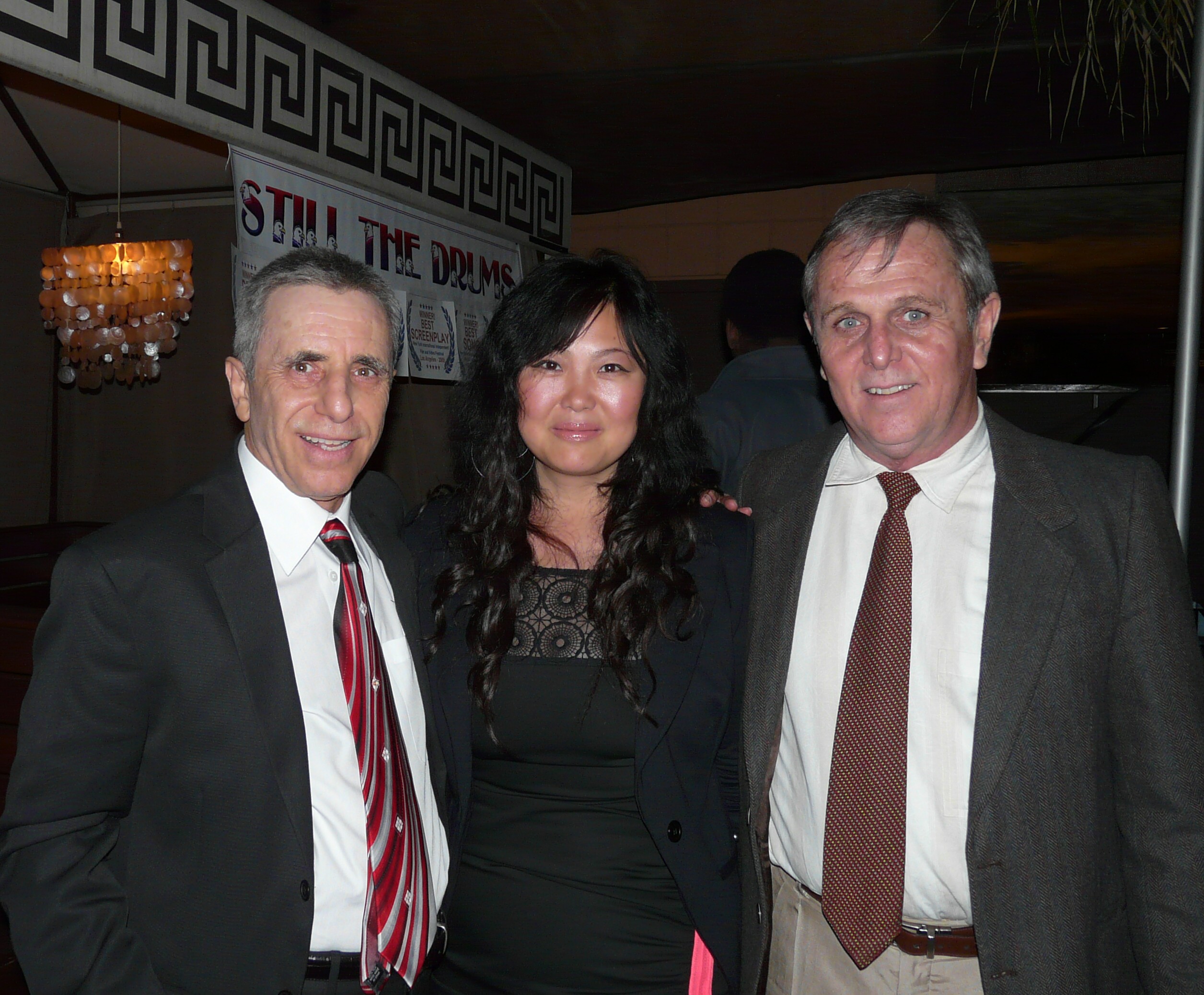 Talbot Perry Simons, Grace Yang and Richard Fulvio at premier of Still The Drums