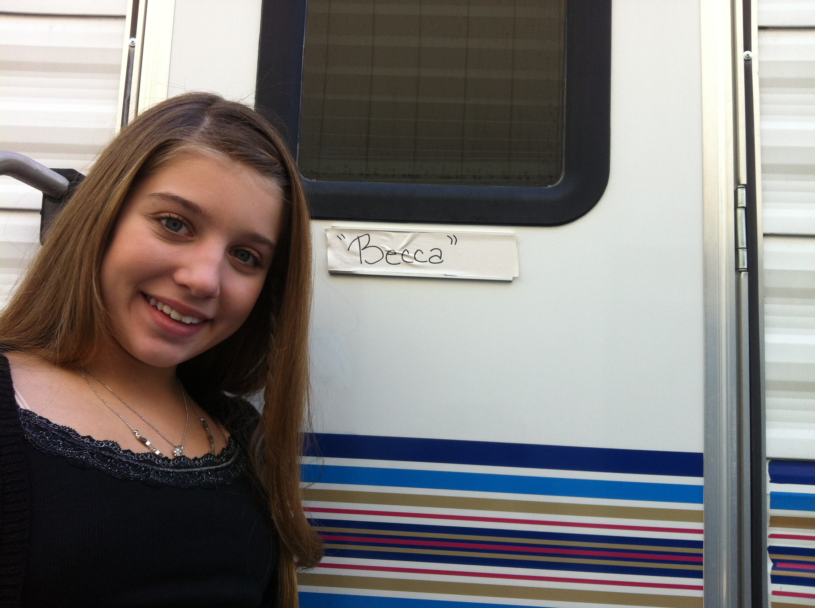 Paris next to her trailer on the set of Modern Family