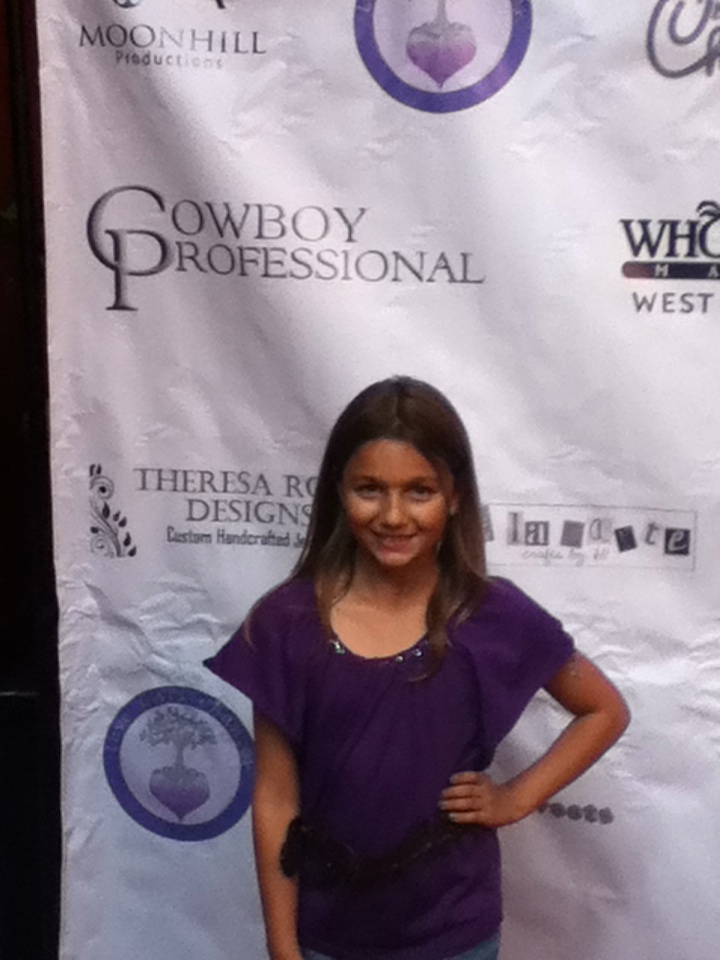Madeline attending the launch party for Love Gives Chances April 2013