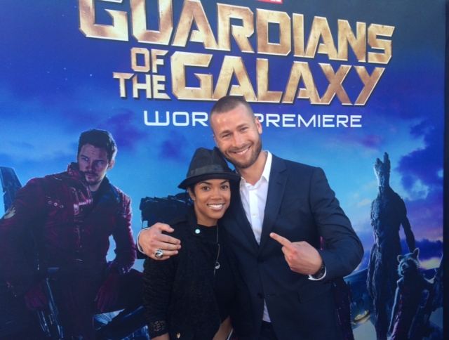 Actress Parris Franz Fluellen and actor Glen Powell on the red carpet for 'Guardians of The Galaxy' movie premiere in Hollywood, at the Dolby Theatre