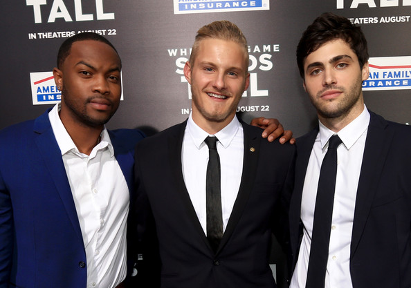 Ser'Darius Blain, Alexander Ludwig and Matthew Daddario strike a pose on the red carpet for When the Game Stands Tall