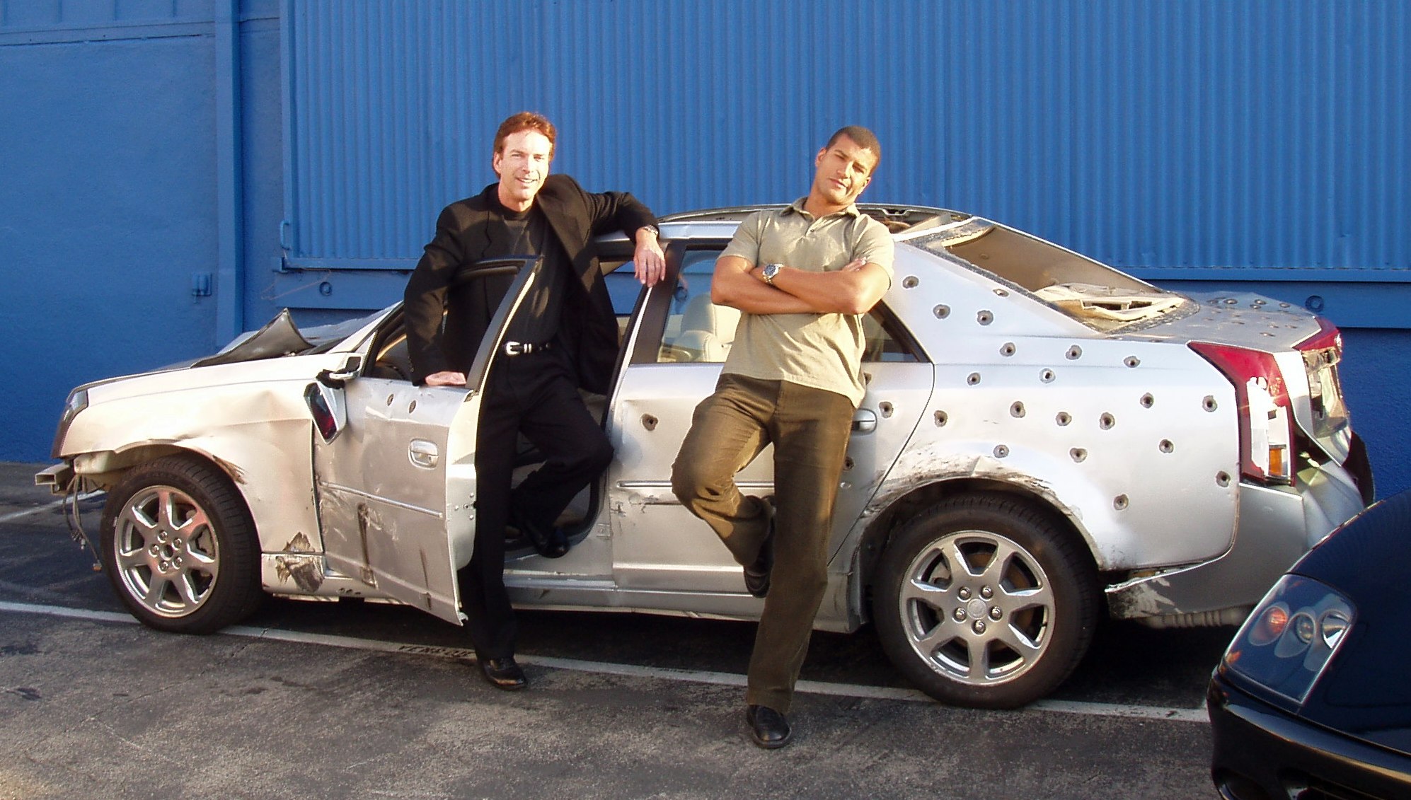 C. Van Tune, Emmett Miller, during KTLA News segment with Cadillac stunt car from The Matrix Reloaded.