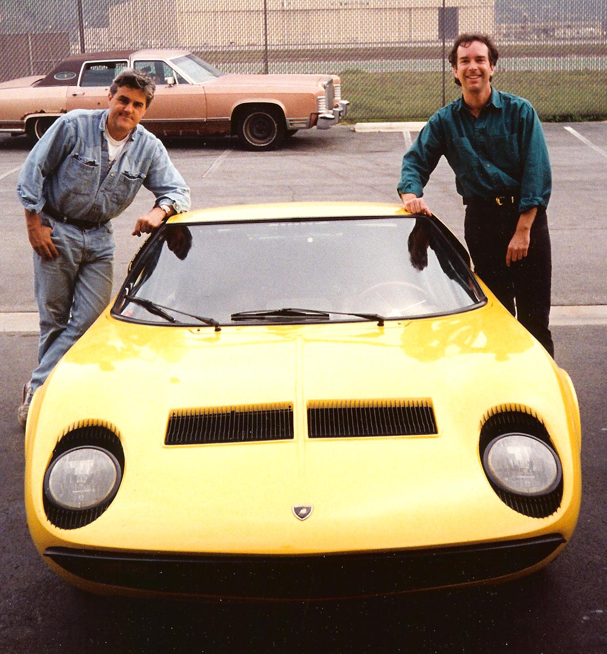 Jay Leno, C. Van Tune, at Leno's garage with his Lamborghini Miura.