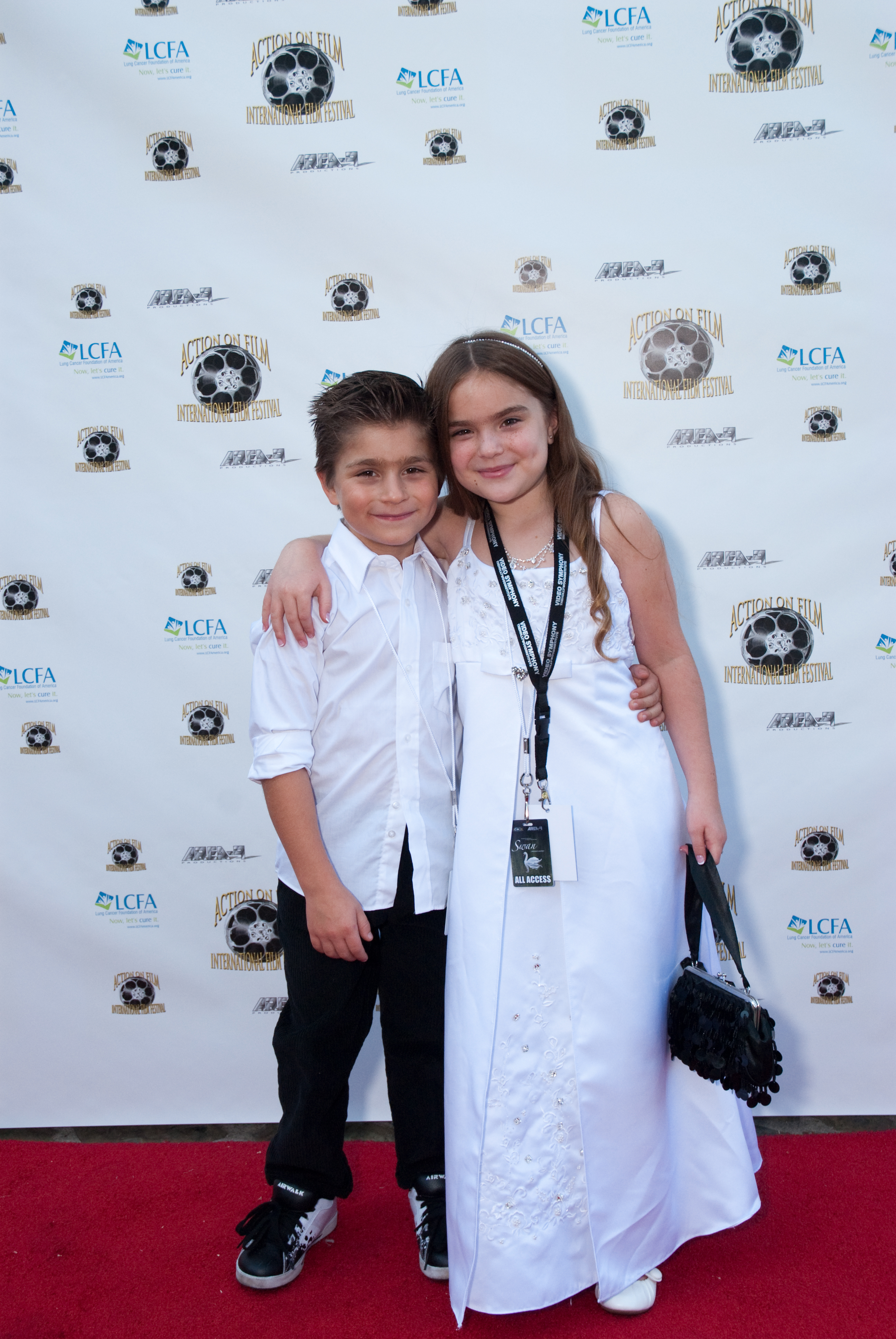 HannaH Eisenmann & Stone Eisenmann on the Red Carpet For the Lung Cancer Foundation of America Charity event / Premiere of SWAN ..ONE MAN'S JOURNEY