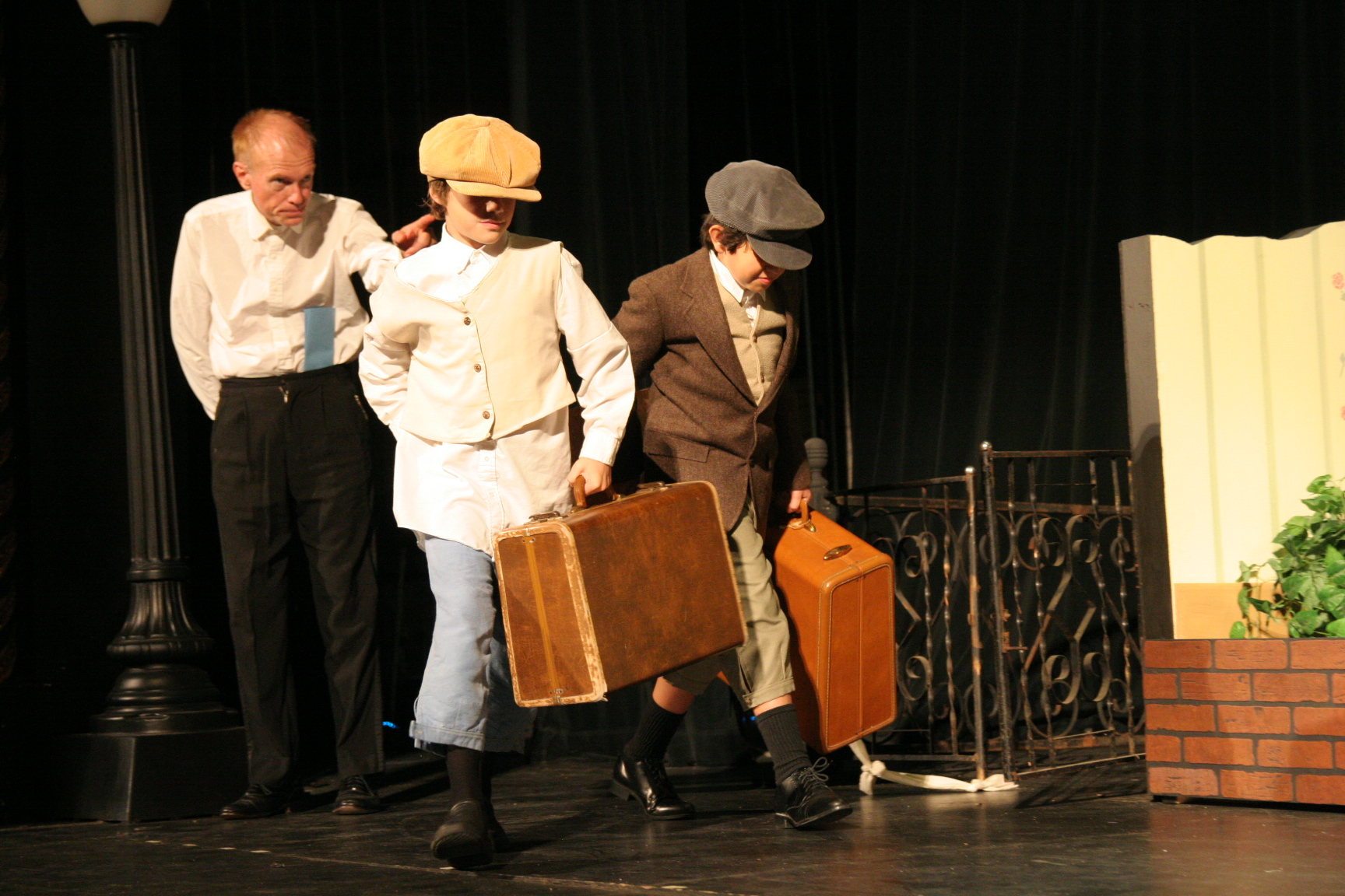Tryston Skye in The Remarkable Mr. Pennypacker on stage with Don Jorgensen and Isaac Cervantes