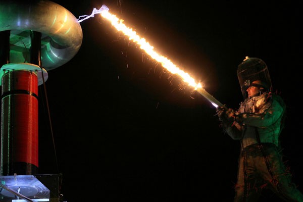 Burning a piece of wood with the Tesla Coil electrical discharges.