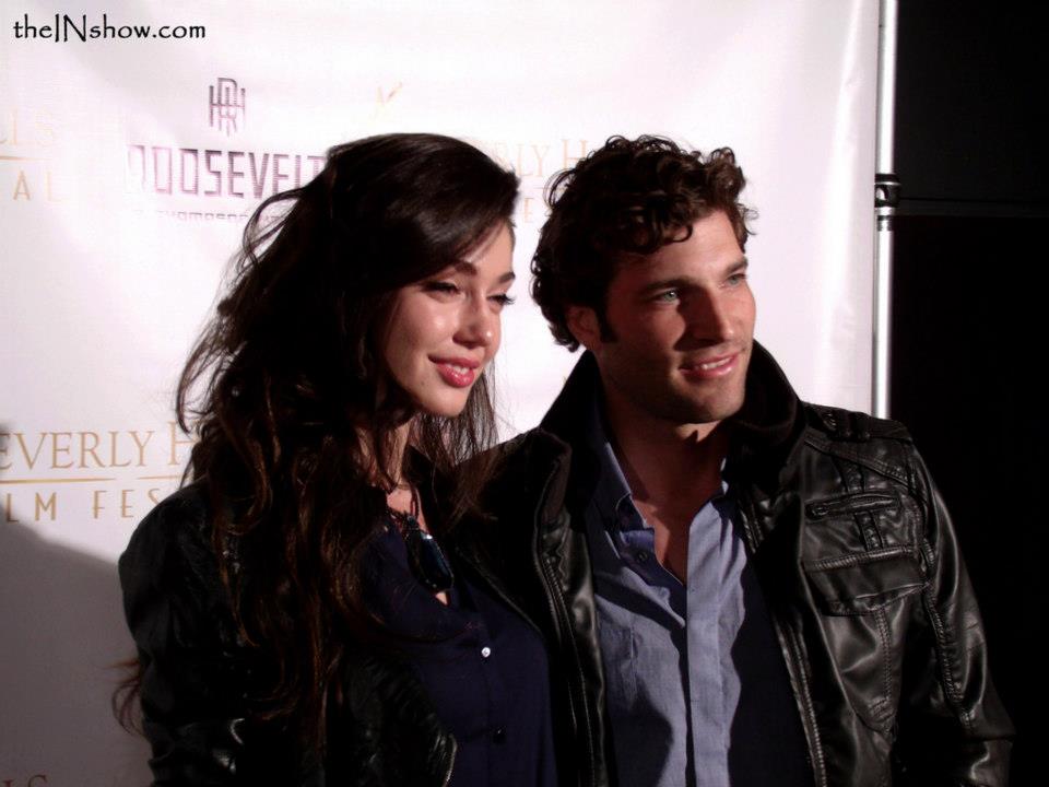 HOLLYWOOD, CA - MAY 08: Actor/Writer/Producer of Johnny Games, Nicholas Givanio and Leading lady Emilia Zoryan attends the 13th Annual Beverly Hills Film Festival Opening Night Gala held at TCL Chinese Theatre on May 8, 2013 in Hollywood, Ca.