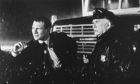 Still of Christian Slater and Edward Asner in Hard Rain (1998)