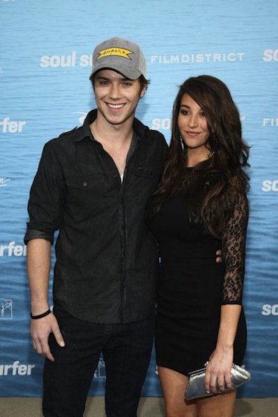 Jeremy Sumpter and Genevieve Helm attending the 