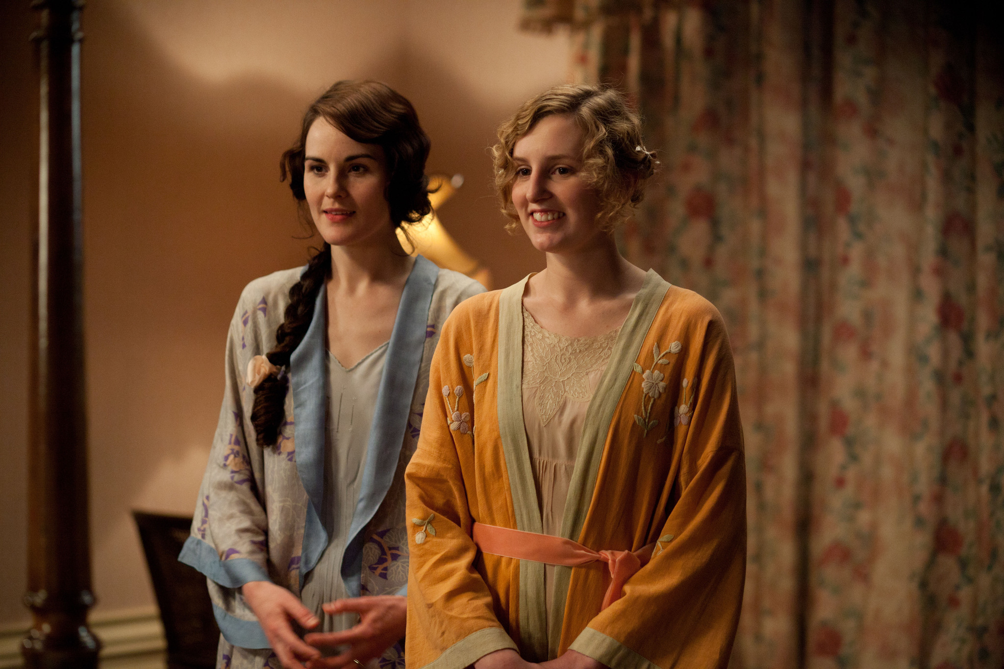 Still of Michelle Dockery and Laura Carmichael in Downton Abbey (2010)