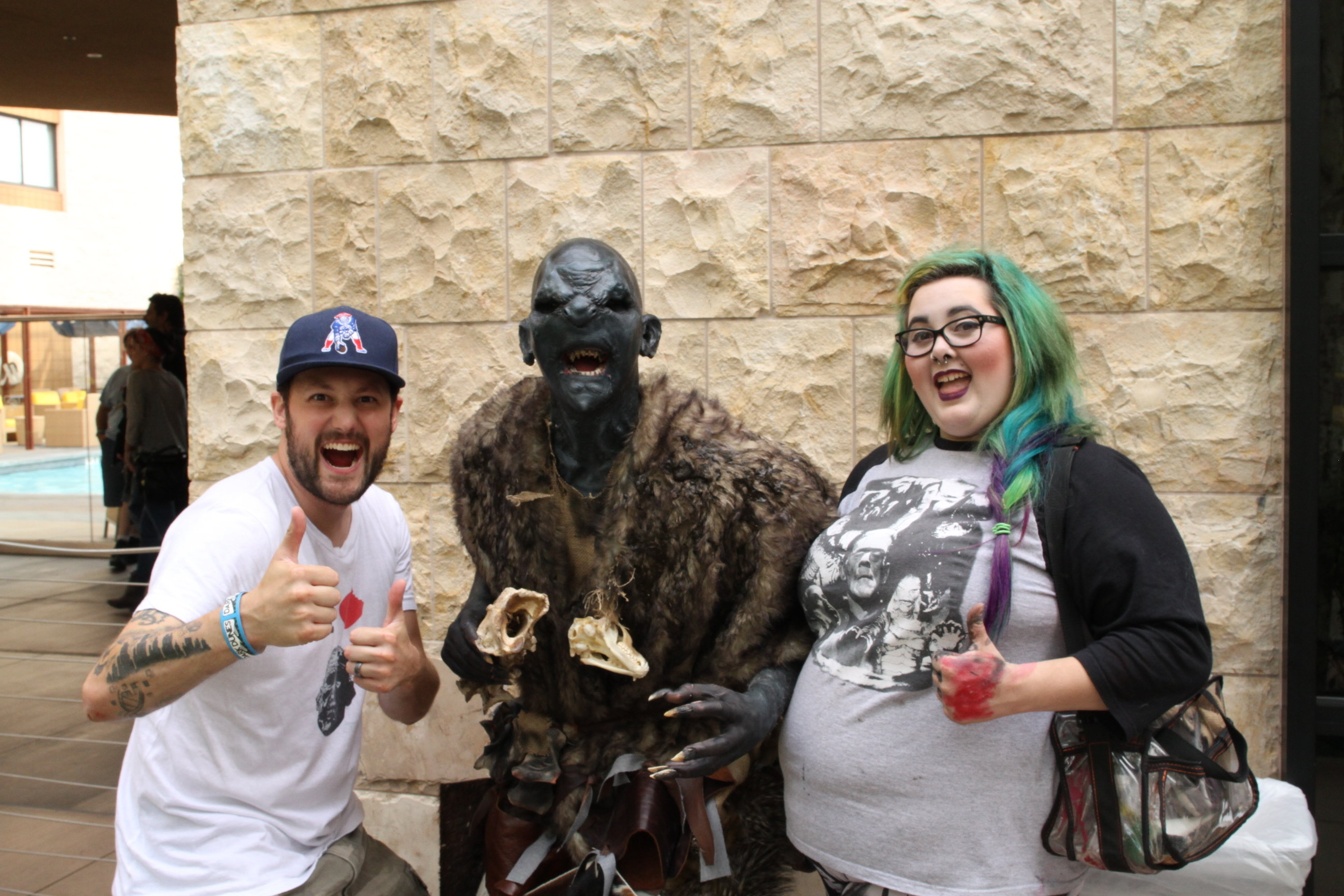 Drew Buerhaus (cinematographer), Alan Maxson (actor) and Melissa Stell (makeup artist) show off the Orc at Monsterpalooza 2014.
