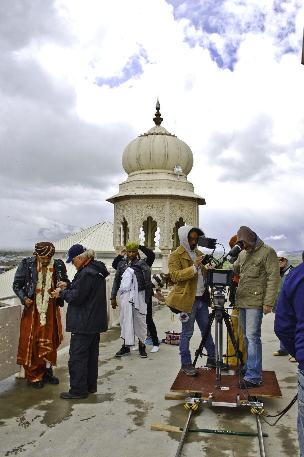 Actor Jullian Dulce Vida with sound mixer Dean Andre, actor Alex Boye' with costume designer Che Hurley and camera crew, including cinematographer Reuben Steinberg, right, on location in Utah.