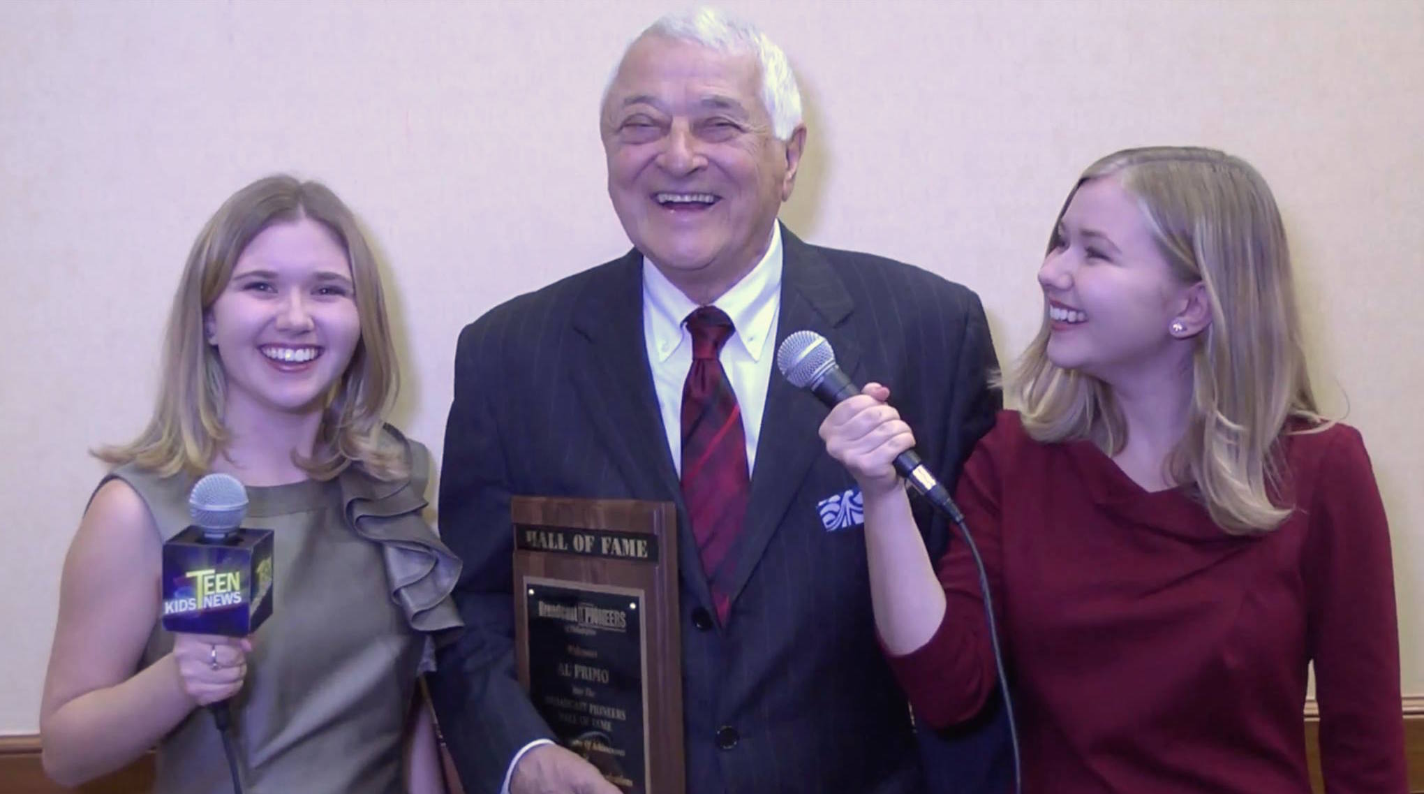 Cailin Loesch (right) with sister Hannah Loesch and Al Primo at the Broadcast Pioneers of Philadelphia Hall of Fame