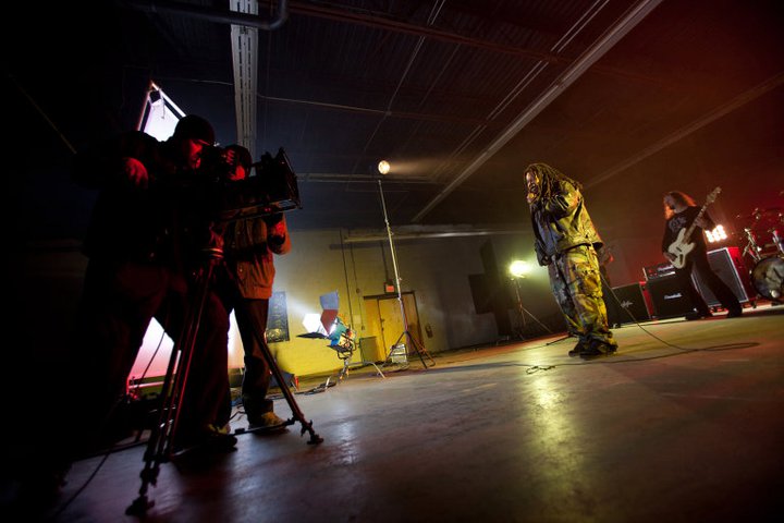 Director Ian McFarland checking framing on a music video shoot