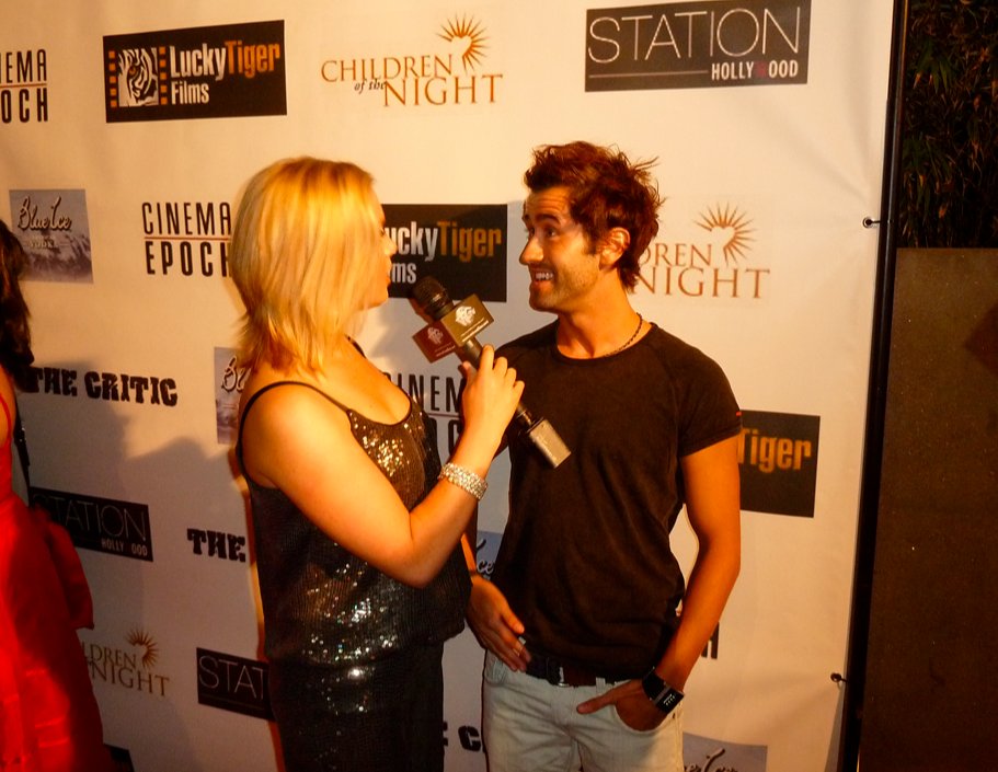 David Scharschmidt being interviewed by WTV on the red carpet of The Critic's wrap party at Station in Hollywood.