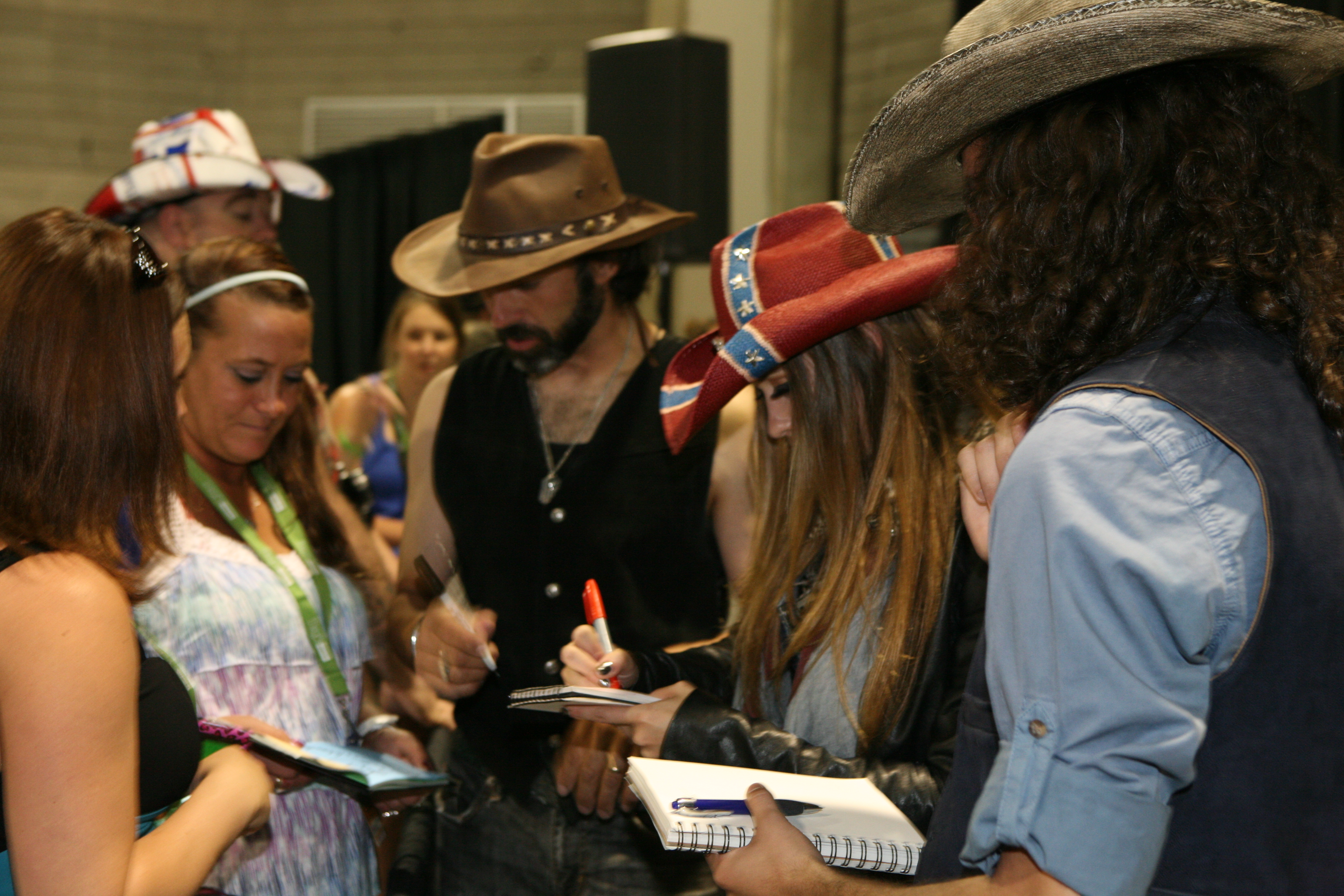 Angel Mary & the Tennessee Werewolves signing autographs at Fan Fair CMA FEST