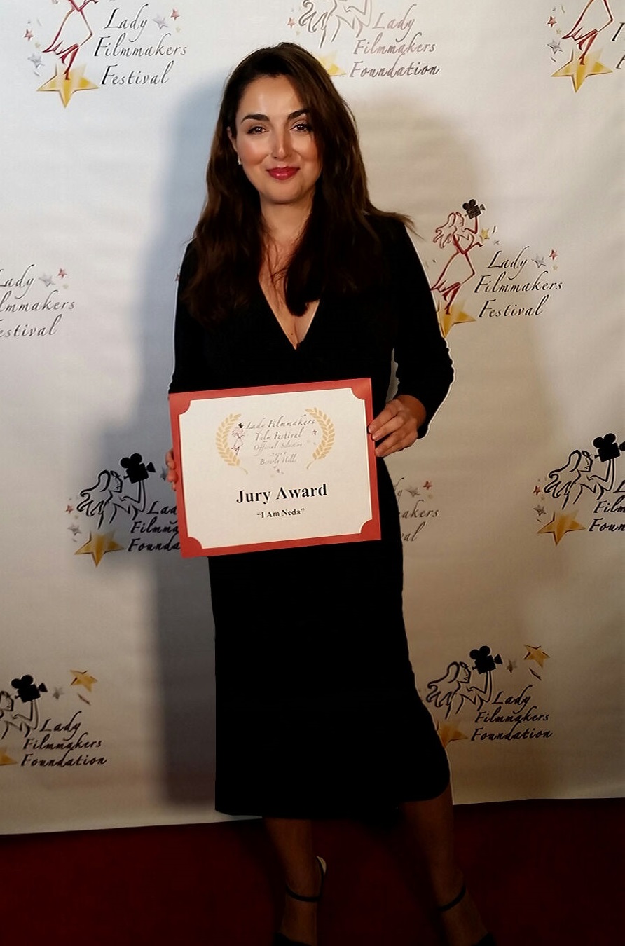 Award-winning Director And Actor Nicole Kian Sadighi on the red carpet at the Lady Filmmakers Film Festival where 'I Am Neda' was the official selection and winner of the Jury Award