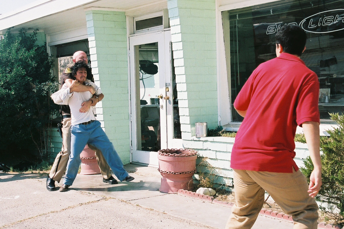 Police Officer (Neil Ruddy), Manuel (Paul Alayo) and Hannibal (Julio Dominguez).