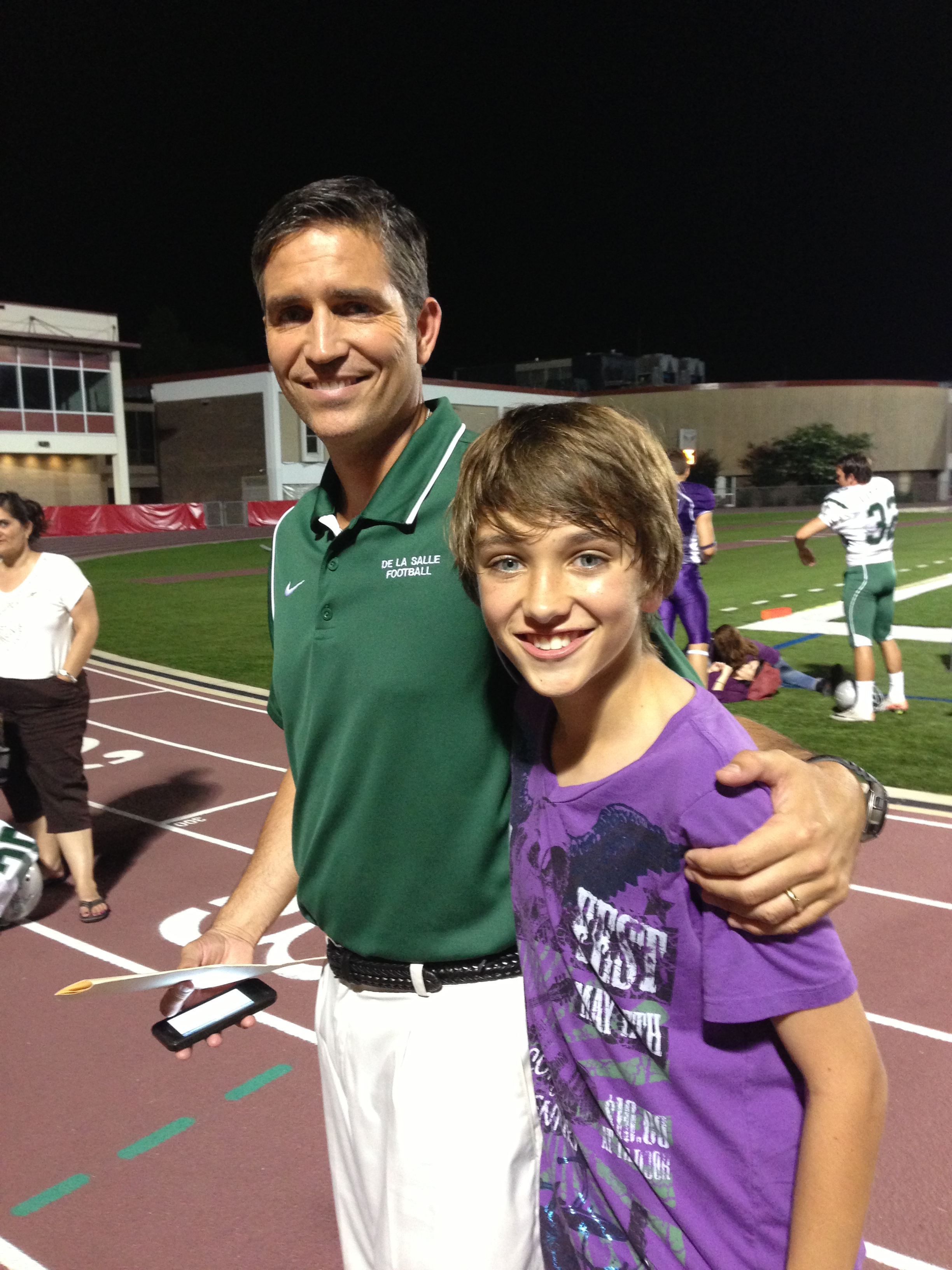 Gavin Casalegno and Jim Caviezel on the set of When the Game Stands Tall