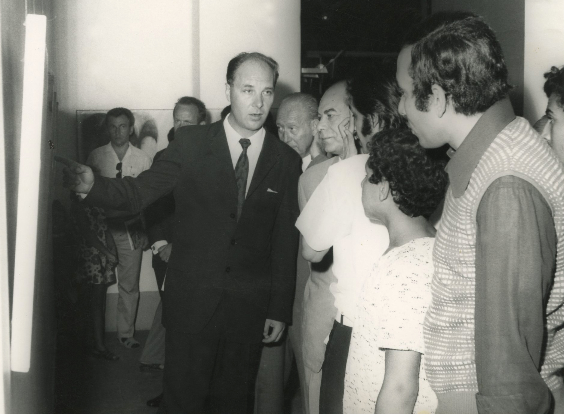 Farouq (seen on right) attending the opening of the Czeck artist V. Chalkovsky's exhibition whom he later interviewd for the daily 'Al Massa' in 1974