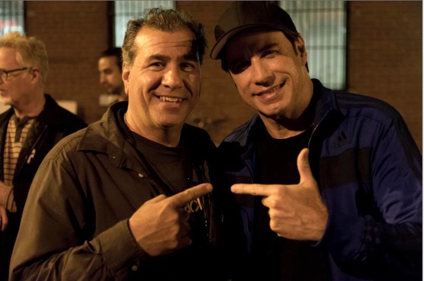 Production designer Peter Cordova with John Travolta